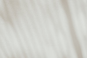 a close up view of a white fabric